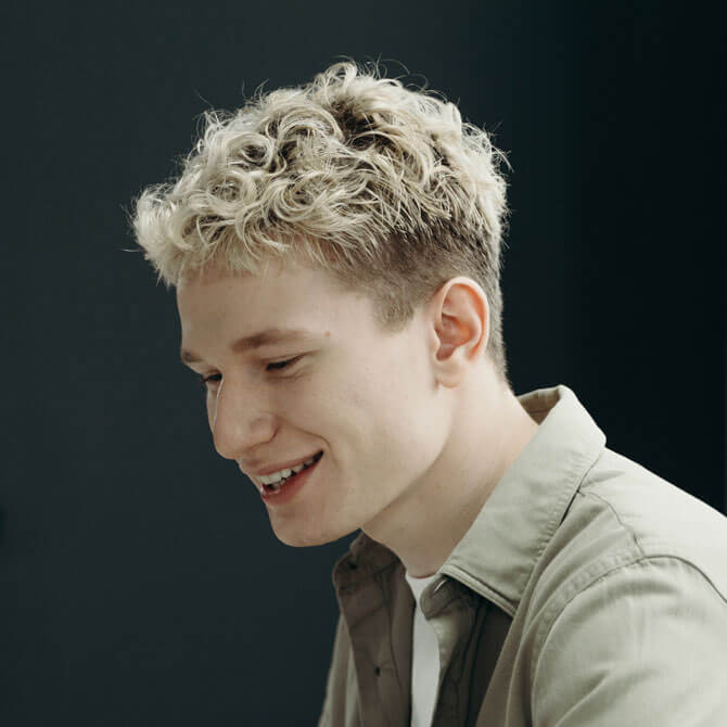 Portrait of Alex James, web developer